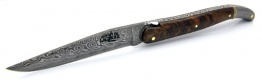 Rambaud 12 cm Messer Griff in Nussbaumwurzeln, hintere Mitre in Inox, Klinge aus rostfreiem Damast. Finish glänzend.